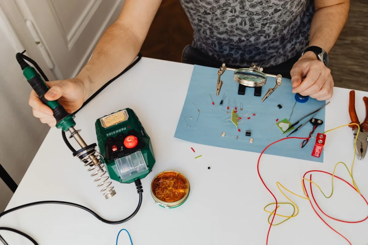 Multimeter connected in line with a Can-Am negative battery cable during a key off draw test