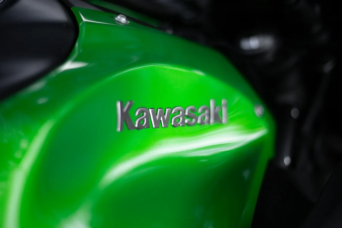 Kawasaki Mule engine bay showing the recoil cover over the stator