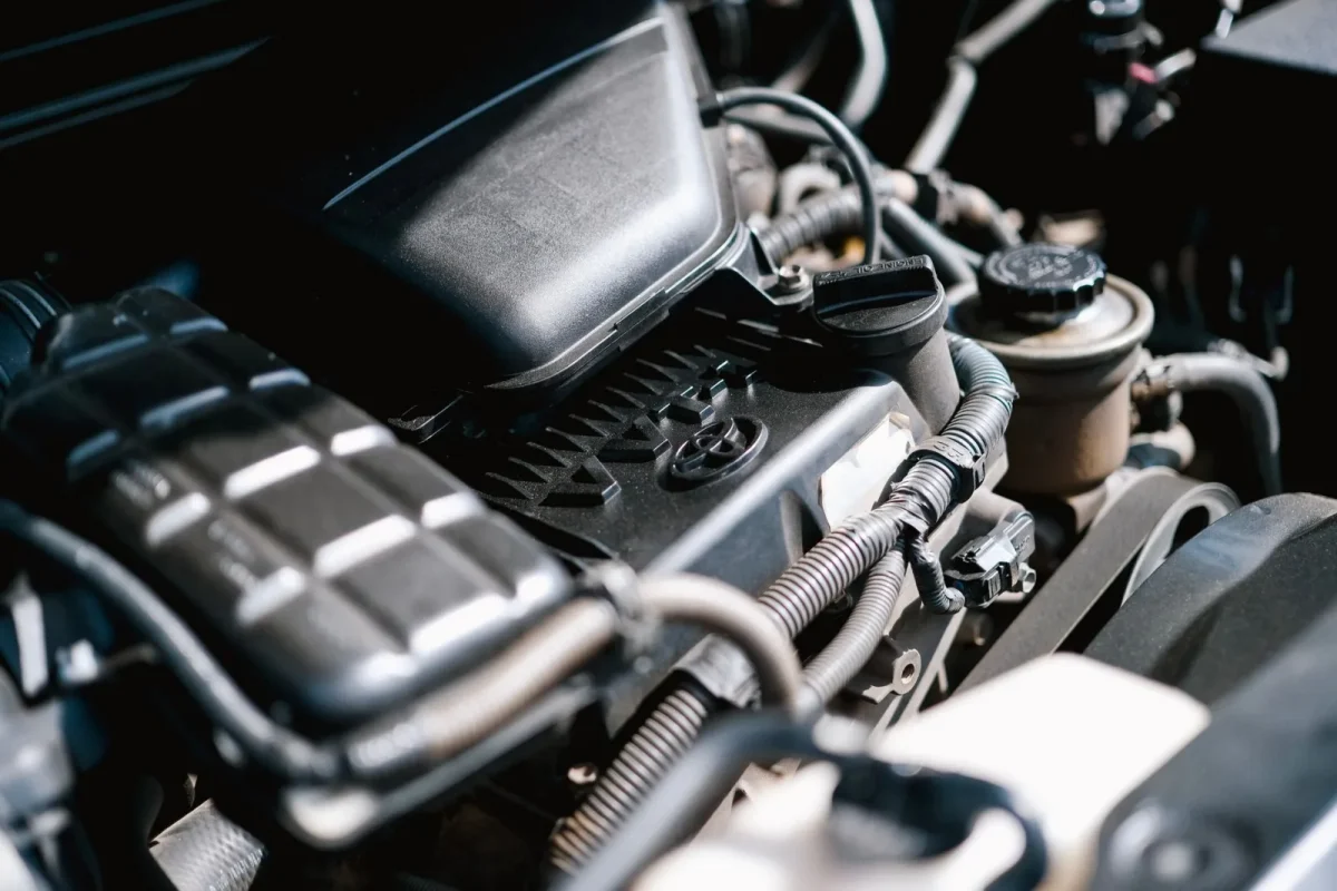 Polaris Ranger engine bay showing stator and regulator wiring