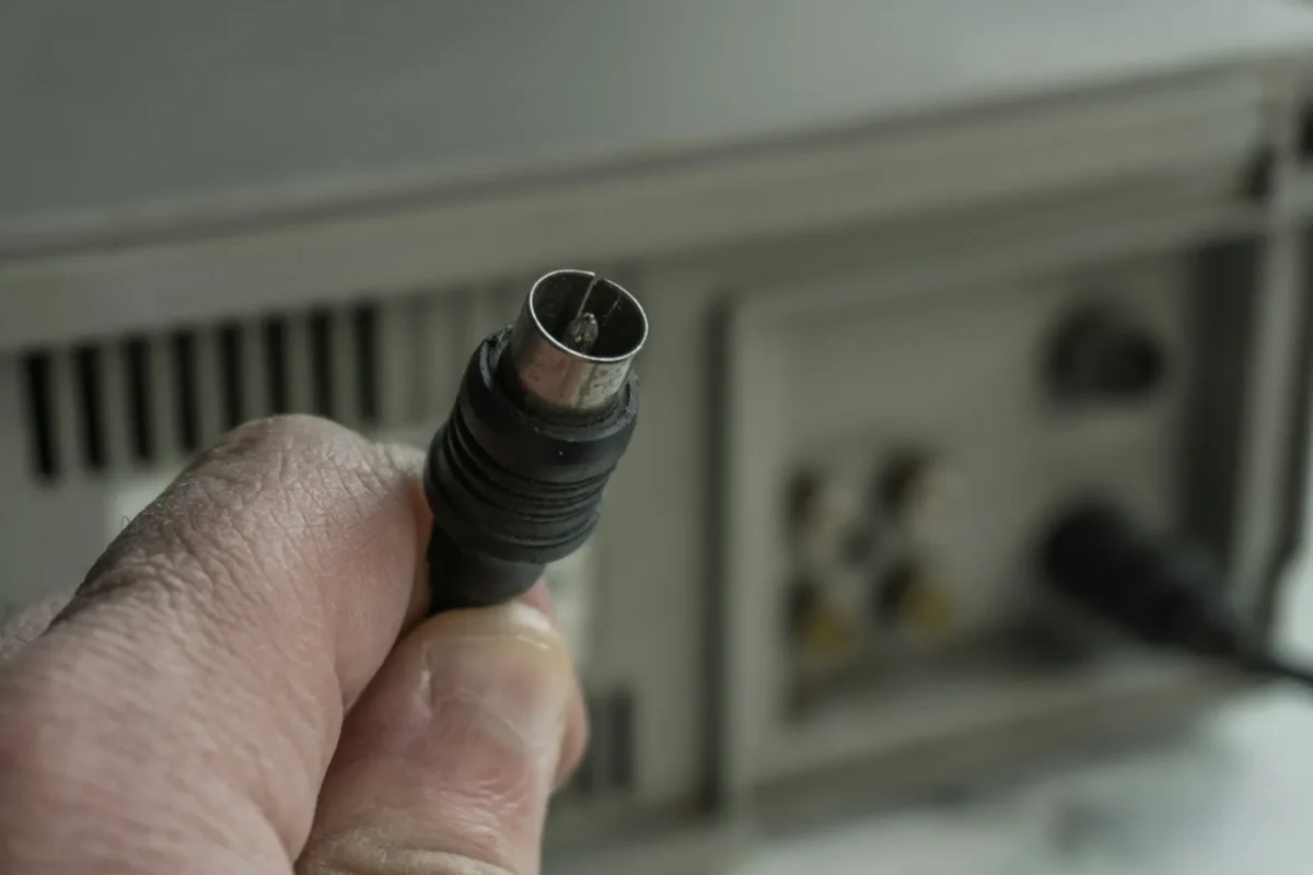Multimeter probes reading AC voltage from a UTV stator connector