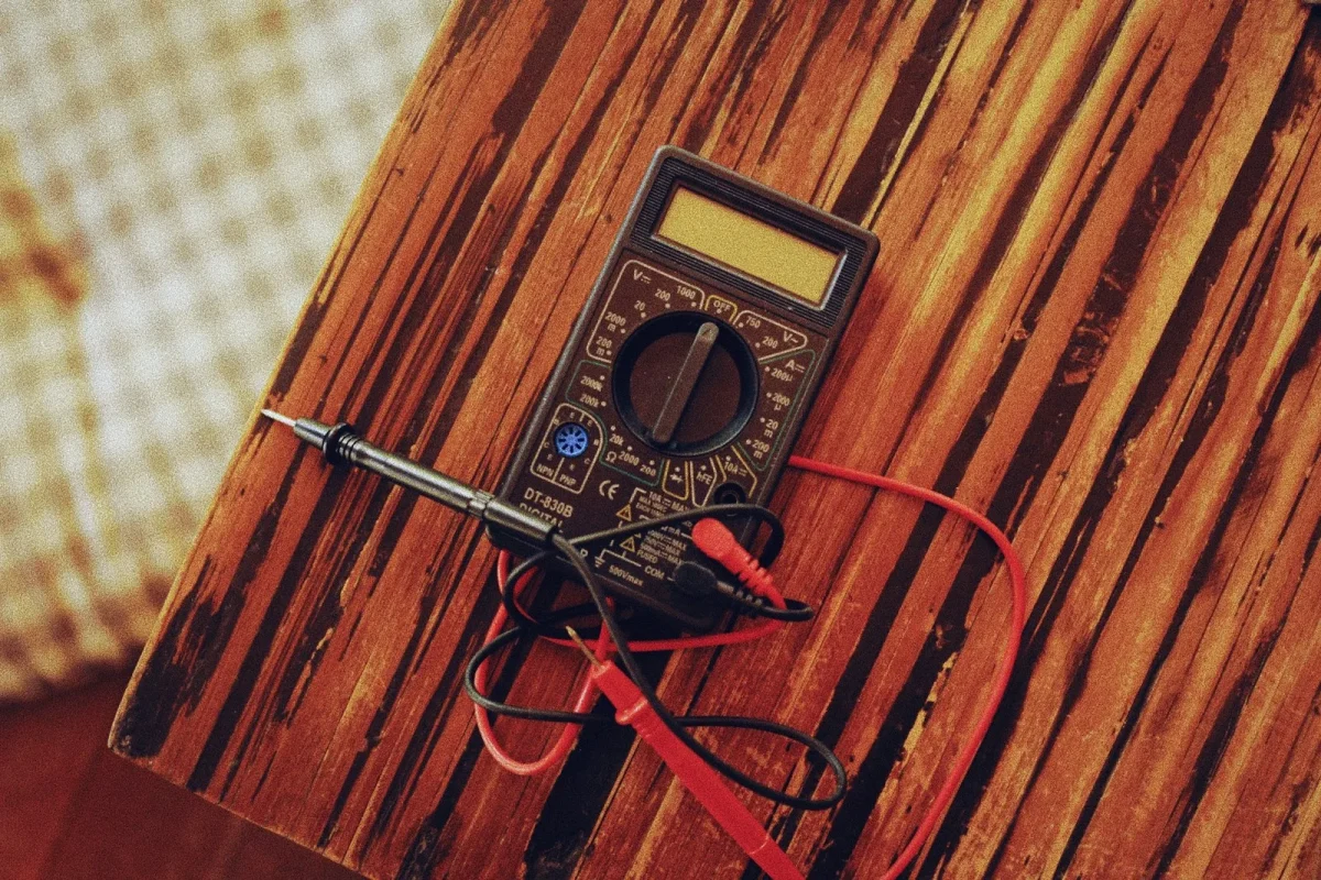 Testing a Yamaha Grizzly battery voltage with a multimeter